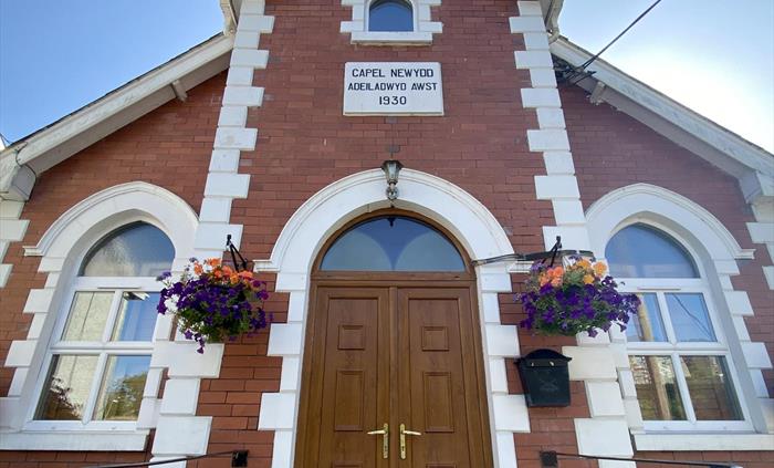 Our 4 hanging baskets brighten up the lovely entrance to our chapel during spring, summer and most of autumn